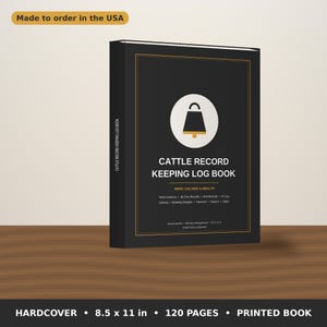 May include: A black hardcover cattle record keeping log book measuring 8.5 x 11 inches. The cover features a white circle with a bell icon, the title, and text listing herd, calving, and health records. It includes 120 pages for tracking.