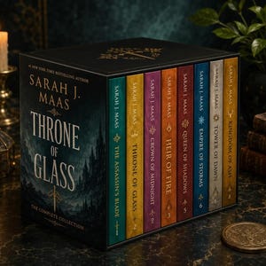 May include: A complete book collection box set by Sarah J. Maas titled Throne of Glass. The black box features a castle illustration and gold text. Inside are eight colourful book spines numbered one through eight, including titles like The Assassin's Blade, Crown of Midnight, Heir of Fire, Queen of Shadows, Empire of Storms, Tower of Dawn, and Kingdom of Ash.