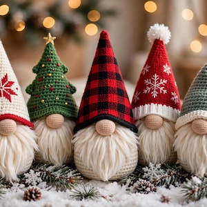 May include: Five crocheted gnomes with long white beards and round noses. The hats feature varied designs: a cream one with a red snowflake, a green tree with gold beads, a red and black buffalo plaid, a red one with white snowflakes, and a sage green.