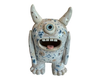 Monster Handmade winter snow Monster Sculpture cute monster with gold snowflakes and snowflake tongue