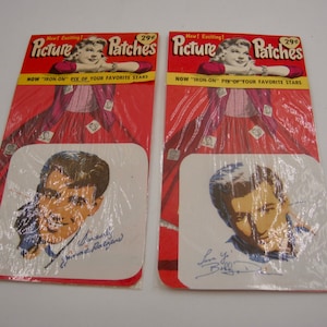May include: Two vintage iron-on picture patches featuring a photo of a man with a signature. The patches are packaged on a red background with the text "New! Exciting! Picture Patches 29¢ NOW "IRON-ON" PIX OF YOUR FAVORITE STARS"