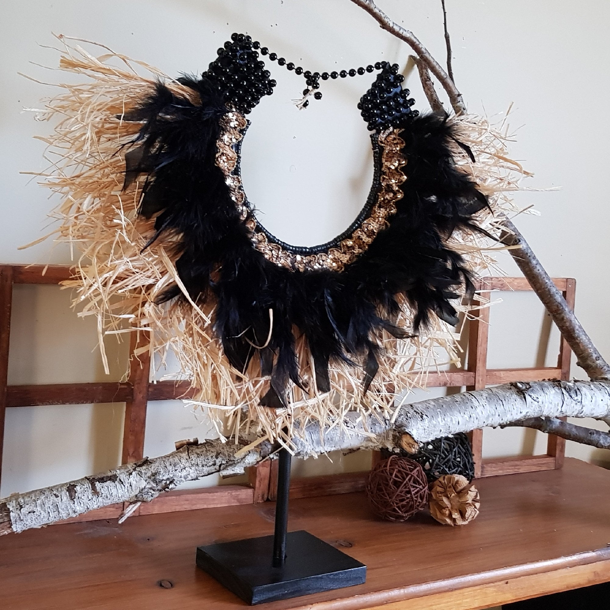 Feather necklace on stand clearance
