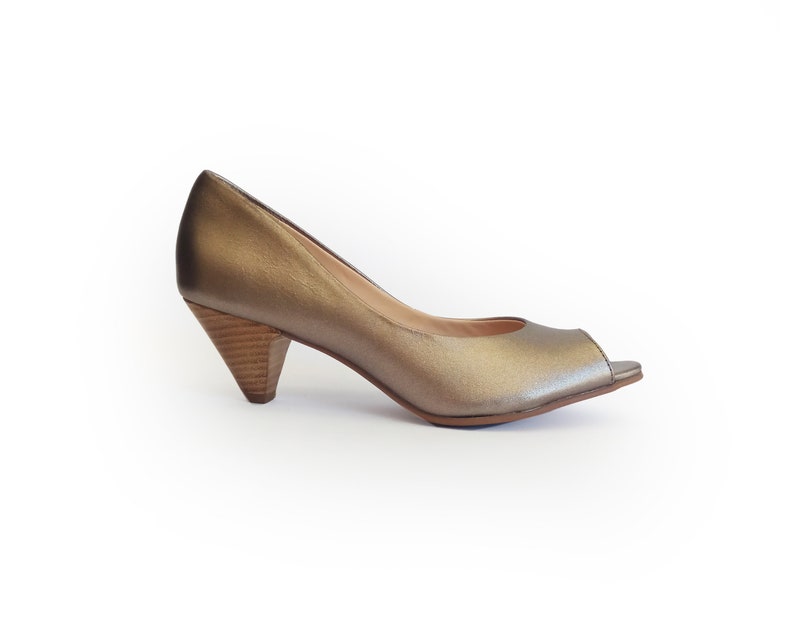 gold court shoes block heel