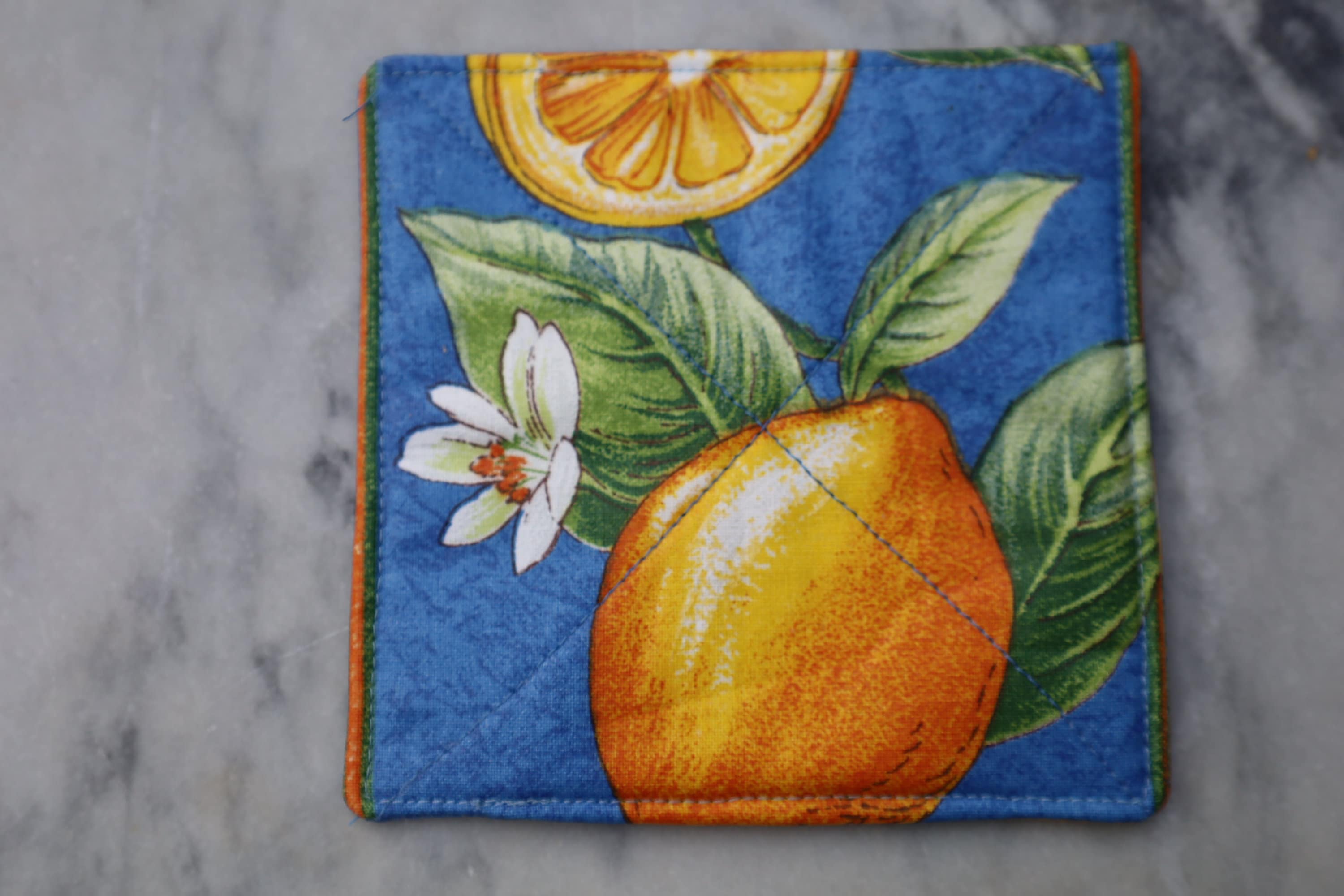 EASY CARE Wipe-able stain proof fabric. Set of 4 cotton coated handcrafted coasters. yellow lemons print. white flowers Provence gift Blue