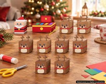 Könnte beinhalten: Ein Set aus Papierbastelboxen mit einer Weihnachtsmannfigur, einem roten Schlitten und acht braunen Rentieren mit Geweih. Die quadratischen Boxen zeigen Cartoon-Gesichter, rote Halsbänder und gelbe Glöckchen. Klebestift und Schere liegen bereit.