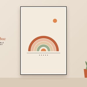 May include: A framed wall art print featuring a semi-circular rainbow graphic in shades of terracotta, peach, and sage green. Above the rainbow is a small orange circle, and below it is a horizontal line with five small black dots.