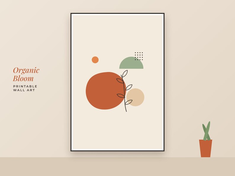May include: A framed wall art print titled Organic Bloom featuring a cream background with a large terracotta circle, a smaller beige circle, a sage green semicircle, a small orange dot, a grid of dots, and a black line drawing of a plant stem.