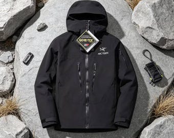 Veste Arc'teryx noire à capuche, coupe-vent imperméable pour activités de plein air, veste technique de randonnée
