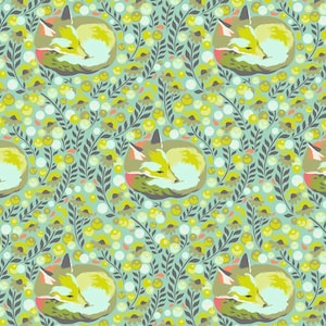May include: A repeating pattern featuring sleeping foxes in shades of yellow, green, and brown, set against a light blue background. The design includes floral and leaf elements in yellow, gray, and white, creating a whimsical, nature-inspired aesthetic.