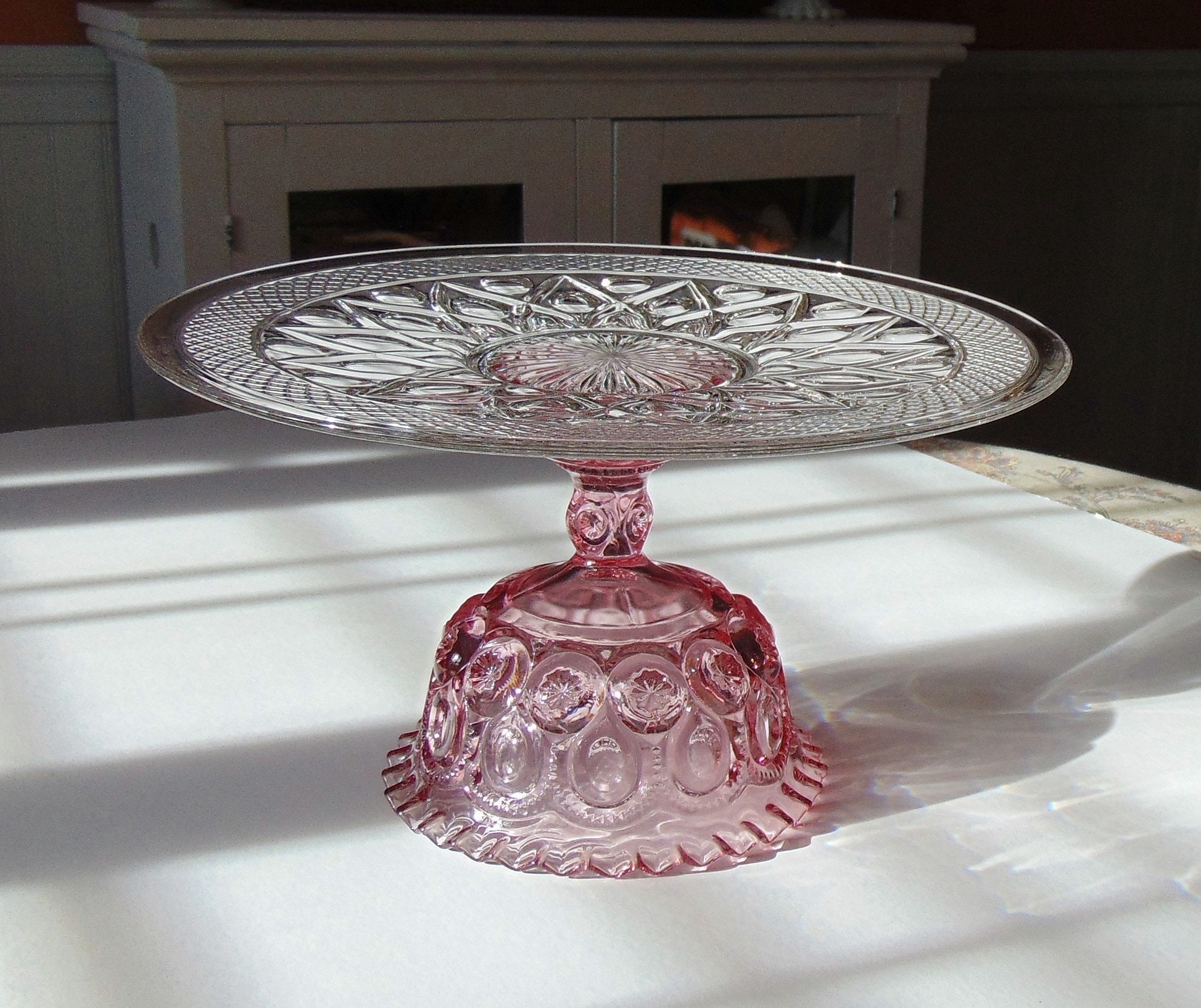 Pink glass cake stand hotsell