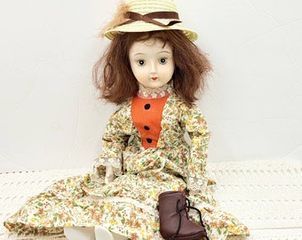 Walda doll, vintage retro Walda wearing brown and orange dress. Vintage porcelain dolls, southern belle