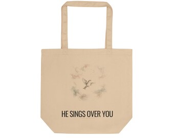 He Sings Over You Tote Bag, Zephaniah 3:17 Canvas Tote, Christian Tote Bag, Faith Gift for Her, Bible Verse Tote