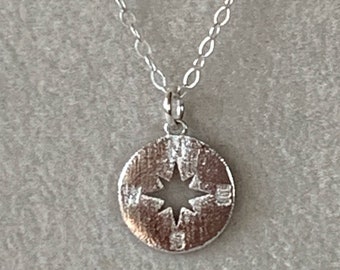 silver compass pendant