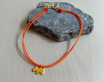 orange dog charm cord bracelet / gold