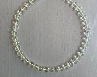 round clear quartz necklace on lime green cord / large, faceted