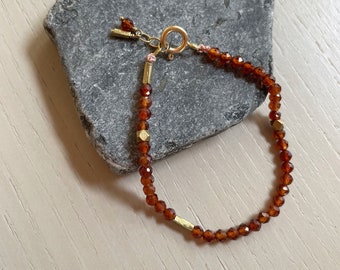 dainty orange hessonite garnet bracelet / adjustable