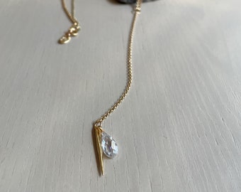 gold Y necklace on brass chain