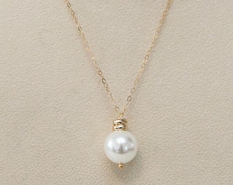 pearl pendant with gold rings