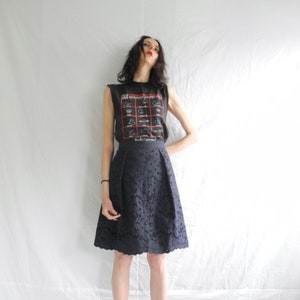 90&#39;s navy hippie/minimal skirt with allover embroidered with cut outs and scalloped hem.