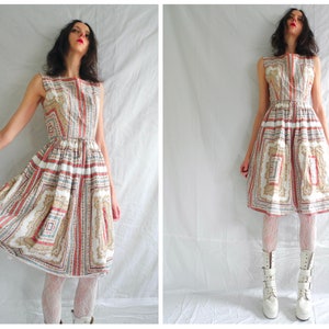 Jaren 50 rockabilly katoenen wit/rood/blauw/beige grafische bloemenprint knielange mouwloze jurk