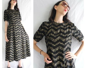 60s/70's goth/glam black and gold metallic floral pattern short sleeve maxi dress