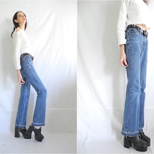 90&#39;s 517 5 JR L hippie mid/high waisted Levi&#39;s boot cut/slim fit mid wash jeans 28&quot;waist.
