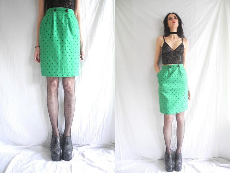 green and black spot dress