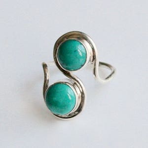 Beautiful open-style ring with natural turquoise stones. Genuine turquoise ring.