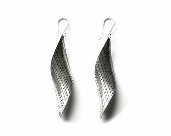 Beautiful long  sleek sterling silver earrings in long swirls leaf with a unique texture  'Long Swirls Dangle Earrings'