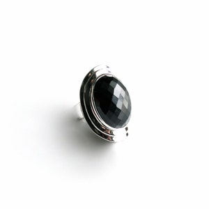 Absolutely stunning black onyx cocktail ring in sterling silver setting. Multi Faceted Oval Cut Onyx gemstone. image 3