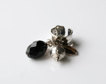 Whimsical silver statement ring with artistic movement of onyx, smoky quartz beads and sterling silver charms.- 'Whimsical charm ring'