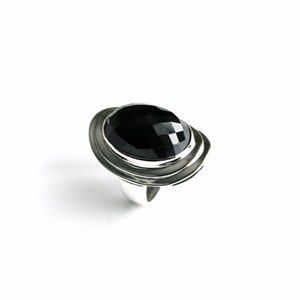 Absolutely stunning black onyx cocktail ring in sterling silver setting. Multi Faceted Oval Cut Onyx gemstone. image 2