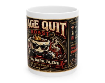 May include: A white ceramic mug featuring a graphic of a coffee cup wearing sunglasses and a crown while holding a game controller. The text reads RAGE QUIT ROAST, EXTRA DARK BLEND, FOR TILTED GAMERS, with a tasting notes sidebar.