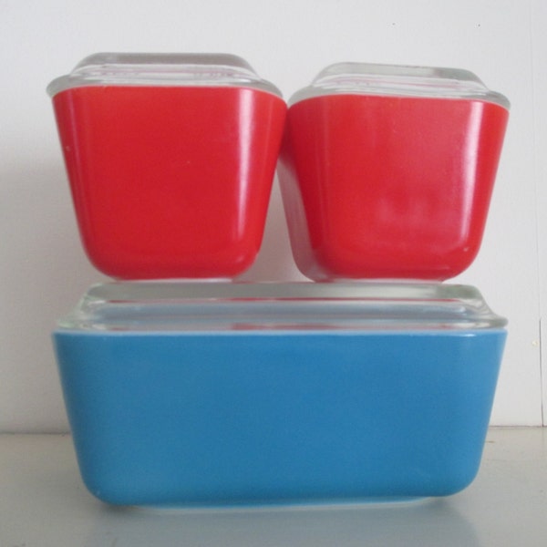 Reserve for R Pyrex Red Blue Primary Refrigerator Dishes With Lids 501 and 502.