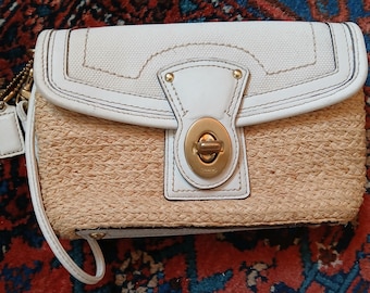 Coach straw white leather turn buckle wristlet.