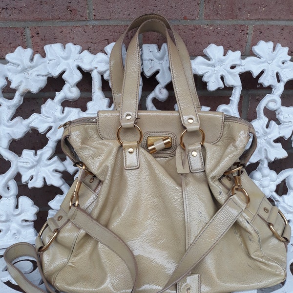 Yves Saint Laurent Patent Leather Muse Style handbag.