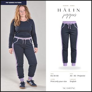 May include: A PDF sewing pattern for HÅLIN joggers featuring a dark navy blue design with light purple trim, a drawstring waistband, and cuffed ankles. The pattern includes sizes EU 34-64, with files for A4, A0, and projector printing in English.