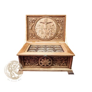 Wooden carved reliquary with representation of the Crucifixion in two dimensions