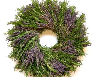 May include: A green rosemary and lavender wreath with purple flowers.