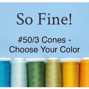 May include: A row of ten spools of thread in various colors, including purple, blue, light blue, green, yellow, orange, and red. The text "So Fine! #50/3 Cones - Choose Your Color" is above the spools.