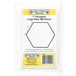 May include: A package of 600 1-inch hexagon-shaped paper pieces for quilting. The package is white with yellow accents and includes the text "Paper Pieces" and "1" Hexagons Large Pack: 600 Pieces".