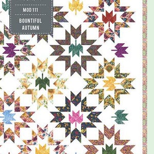 May include: A quilt pattern featuring a white background with a repeating pattern of colorful star-shaped blocks with leaves in the center. The pattern is titled "Bountiful Autumn" and is part of the "Patterns by Moda" collection.