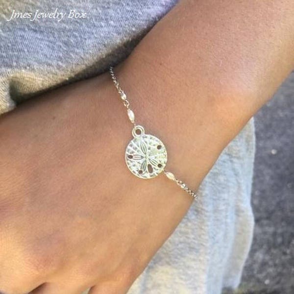 Bracelet dollar des sables en argent avec de petites perles d'eau douce, bracelet dollar des sables, bijoux dollars des sables, bracelet biscuit de mer, biscuit de mer argenté