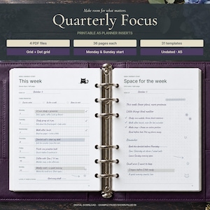 May include: An open A5 planner with purple leather covers featuring white pages with grid and dot grid layouts. The left page is titled This Week and the right page is titled Space for the week. The text includes Quarterly Focus and 4 PDF files.