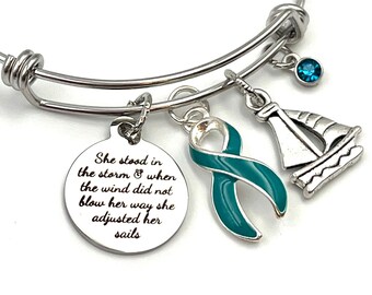 Teal Ribbon Charm Bracelet / Ovarian Cancer, Myasthenia Gravis, POTS, PTSD, Trigeminal Neuralgia, Scleroderma Gift - She Stood in the Storm