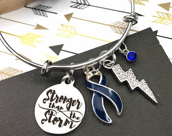 Colon Colorectal Cancer, Crohn's Colitis Spoonie, Epstein-Barr virus, CFS, CVS Bracelet - Dark Blue Ribbon - Stronger than the Storm Jewelry