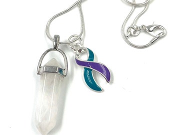 Collar de cristal curativo con lazo morado y verde azulado