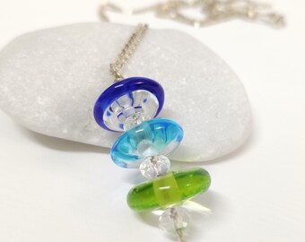 Sterling silver pendant with Murano glass beads in blue and green, with a long sterling silver chain. Boho style, handmade lampwork beads