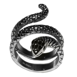 May include: A silver snake ring with a coiled design. The snake's head is facing forward with a detailed textured pattern.