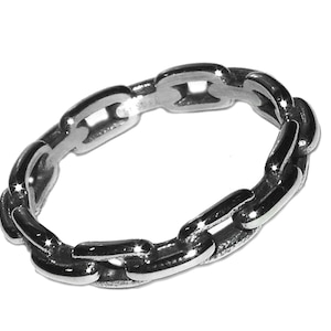 May include: A silver chain ring with a linked design.